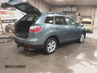 2012 Mazda CX-9 Touring z VIN JM3TB3CV8C0358099, wystawiony jako IAAI lot #41478110 z przebiegiem 151 716 mil mil oraz . Historia ofert i sprzedaży dostępna na DreamBid. Obrazek 4.