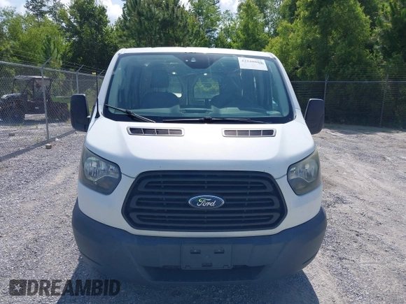 2017 Ford Transit Cargo z VIN 1FTYR2ZM2HKA21541, wystawiony jako IAAI lot #42540880 z przebiegiem 177 013 mil mil oraz . Historia ofert i sprzedaży dostępna na DreamBid. Obrazek 12.