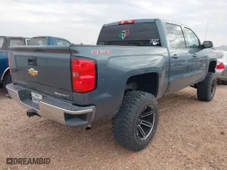 2014 Chevrolet Silverado 1500 LT with VIN 3GCUKREC5EG126344, listed as a IAAI auction lot 41964577 with 102,303 mi miles. Bid and sale history available at carsss.com. Image 4.
