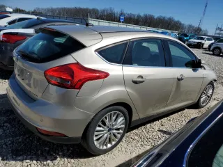 2017 Ford Focus Titanium with VIN 1FADP3N26HL342853, listed as a Copart auction lot 46433395 with 173,966 mi miles and Salvage Title. Bid and sale history available at carsss.com. Image 3.
