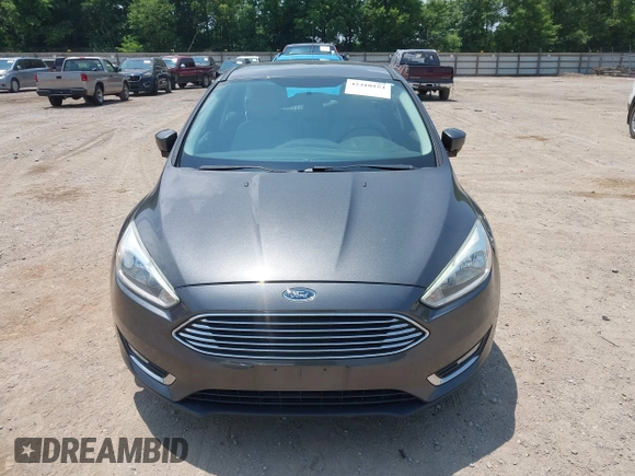 2016 Ford Focus Titanium with VIN 1FADP3N28GL299339, listed as a IAAI auction lot 42410154 with 78,245 mi miles and . Bid and sale history available at DreamBid. Image 12.