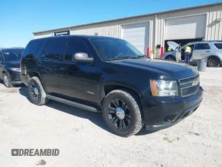 2013 Chevrolet Tahoe Commercial z VIN 1GNLC2E04DR306359, wystawiony jako IAAI lot #41362870 z przebiegiem 211 981 mil mil oraz . Historia ofert i sprzedaży dostępna na DreamBid. Obrazek 1.