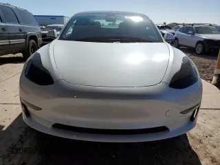 2021 Tesla Model 3 Standard Range Plus with VIN 5YJ3E1EA7MF978749, listed as a Copart auction lot 43377955 with 51,871 mi miles and Salvage Title. Bid and sale history available at carsss.com. Image 5.