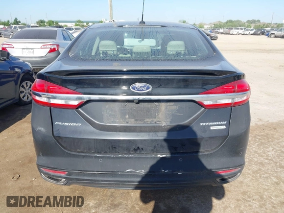 2017 Ford Fusion Titanium with VIN 3FA6P0K9XHR118057, listed as a IAAI auction lot 41982261 with 151,704 mi miles. Bid and sale history available at carsss.com. Image 16.