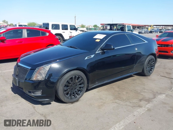 2012 Cadillac CTS with VIN 1G6DC1E31C0140289, listed as a IAAI auction lot 42300201 with 143,970 mi miles and . Bid and sale history available at DreamBid. Image 2.