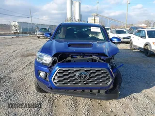 2023 Toyota Tacoma 4WD SR with VIN 3TYCZ5AN1PT119133, listed as a IAAI auction lot 41574906 with 19,887 mi miles. Bid and sale history available at carsss.com. Image 11.