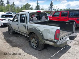 2002 Nissan Frontier SE with VIN 1N6ED27T82C390768, listed as a IAAI auction lot 42235117 with 187,974 mi miles and . Bid and sale history available at DreamBid. Image 3.