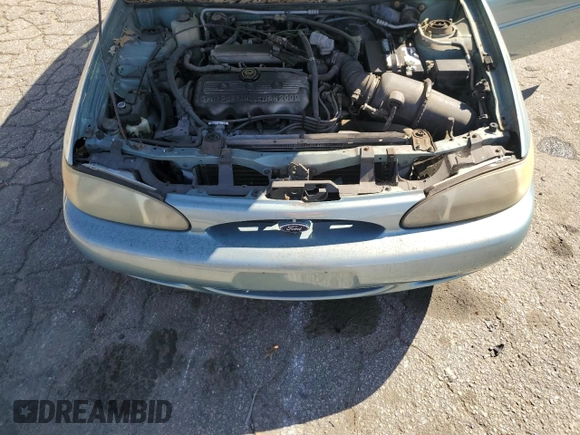 1999 Ford Escort SE с VIN 1FAFP13P4XW252433, выставлен на аукционе Copart как лот 47304895 с пробегом 82 169 миль миль и Чистый • Clean title. История ставок и продаж доступна на DreamBid. Изображение 11.