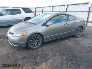 2007 Honda Civic Cpe LX with VIN 2HGFG126X7H558149, listed as a IAAI auction lot 41868081 with 186,517 mi miles. Bid and sale history available at carsss.com. Image 2.