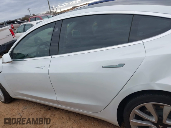 2020 Tesla Model 3 Standard Range Plus with VIN 5YJ3E1EA1LF738062, listed as a IAAI auction lot 41747581 with 41,897 mi miles. Bid and sale history available at carsss.com. Image 13.