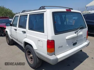 2000 Jeep Cherokee z VIN 1J4FT48S8YL214074, wystawiony jako IAAI lot #42577235 z przebiegiem 287 868 mil mil oraz . Historia ofert i sprzedaży dostępna na DreamBid. Obrazek 3.