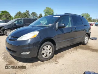 2010 Toyota Sienna XLE with VIN 5TDYK4CC2AS290167, listed as a Copart auction lot 56011735 with 186,877 mi miles and Salvage title. Bid and sale history available at DreamBid. Image 1.