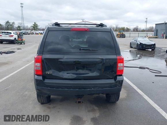 2014 Jeep Patriot Sport with VIN 1C4NJRBB4ED534026, listed as a IAAI auction lot 41850049 with 178,989 mi miles. Bid and sale history available at carsss.com. Image 16.