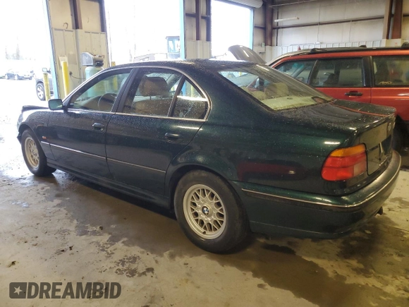 1997 BMW 5 Series 528iA with VIN WBADD6325VBW23550, listed as a Copart auction lot 87943625 with 216,901 mi miles and Salvage Title. Bid and sale history available at carsss.com. Image 2.
