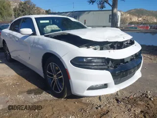 2019 Dodge Charger SXT with VIN 2C3CDXJGXKH533322, listed as a IAAI auction lot 41808838 with 95,877 mi miles and . Bid and sale history available at DreamBid. Image 1.