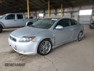 2009 Scion tC with VIN JTKDE167990277992, listed as a Copart auction lot 49703365 with 182,427 mi miles and Salvage Title. Bid and sale history available at carsss.com. Image 1.