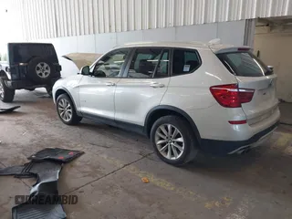 2017 BMW X3 xDrive28i z VIN 5UXWX9C59H0T15441, wystawiony jako IAAI lot #42042589 z przebiegiem 141 484 mil mil oraz . Historia ofert i sprzedaży dostępna na DreamBid. Obrazek 3.