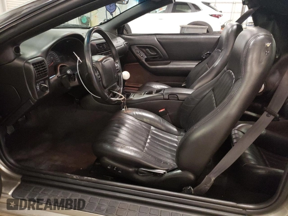 2001 Chevrolet Camaro Z28 z VIN 2G1FP22GX12112874, wystawiony jako Copart lot #70669594 z przebiegiem 58 773 mil mil oraz Szkoda całkowita • Salvage title. Historia ofert i sprzedaży dostępna na DreamBid. Obrazek 7.