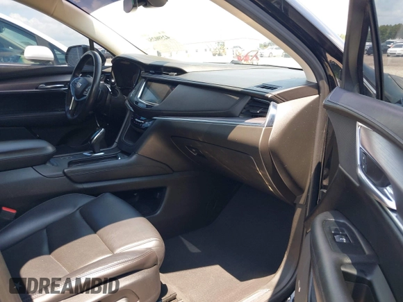 2018 Cadillac XT5 Premium Luxury AWD z VIN 1GYKNFRS3JZ112459, wystawiony jako IAAI lot #42590258 z przebiegiem 157 377 mil mil oraz . Historia ofert i sprzedaży dostępna na DreamBid. Obrazek 5.