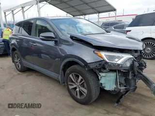 2018 Toyota RAV4 XLE with VIN JTMWFREV4JJ742463, listed as a IAAI auction lot 41920716 with 61,141 mi miles. Bid and sale history available at carsss.com. Image 1.