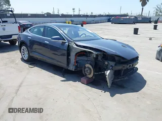 2016 Tesla Model S 90D with VIN 5YJSA1E22GF138236, listed as a IAAI auction lot 42532245 with 72,839 mi miles and . Bid and sale history available at DreamBid. Image 1.