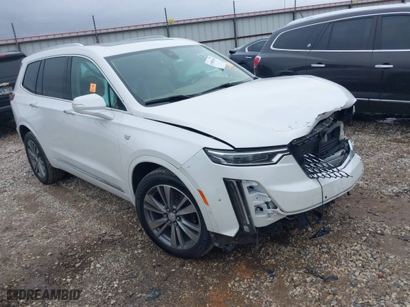 2021 Cadillac XT6 Premium Luxury with VIN 1GYKPFRS0MZ100879, listed as a IAAI auction lot 41083030 with 56,502 mi miles. Bid and sale history available at carsss.com. Image 1.