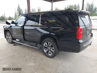 2016 Chevrolet Suburban LTZ with VIN 1GNSKJKC9GR179622, listed as a IAAI auction lot 41987586 with 245,534 mi miles. Bid and sale history available at carsss.com. Image 3.