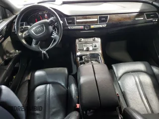 2015 Audi A8 3.0T z VIN WAU3GAFD2FN040940, wystawiony jako Copart lot #65327685 z przebiegiem 113 443 mil mil oraz Czysty tytuł • Clean title. Historia ofert i sprzedaży dostępna na DreamBid. Obrazek 8.
