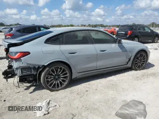 2023 BMW i4 M50 with VIN WBY33AW04PFP53795, listed as a Copart auction lot 42402505 with 20,210 mi miles and Salvage Title. Bid and sale history available at carsss.com. Image 3.
