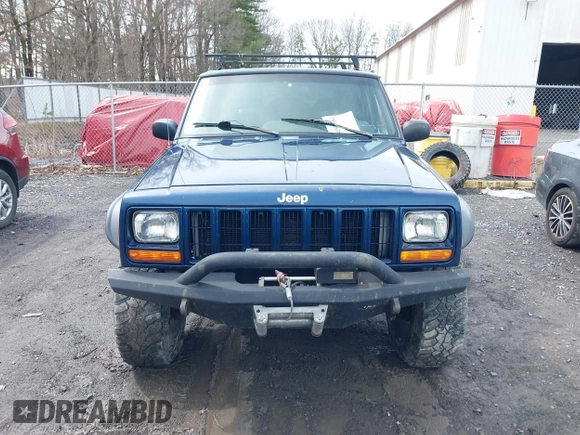 2000 Jeep Cherokee Classic with VIN 1J4FF58SXYL163514, listed as a IAAI auction lot 41920054 with 259,677 mi miles. Bid and sale history available at carsss.com. Image 6.