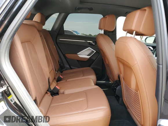 2022 Audi Q3 S line Premium z VIN WA1DECF31N1018850, wystawiony jako Copart lot #52559035 z przebiegiem 44 466 mil mil oraz Szkoda całkowita • Salvage title. Historia ofert i sprzedaży dostępna na DreamBid. Obrazek 11.