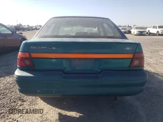1995 Ford Escort z VIN 1FASP14J9SW304866, wystawiony jako Copart lot #73006174 z przebiegiem 126 068 mil mil oraz Szkoda całkowita • Salvage title. Historia ofert i sprzedaży dostępna na DreamBid. Obrazek 6.