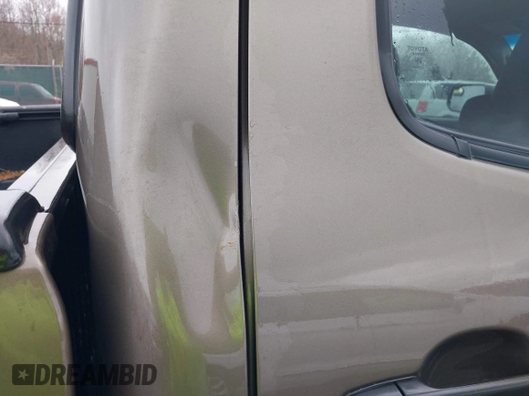 2015 Toyota Tacoma with VIN 3TMLU4EN1FM201554, listed as a IAAI auction lot 42008012 with 118,313 mi miles and . Bid and sale history available at DreamBid. Image 17.
