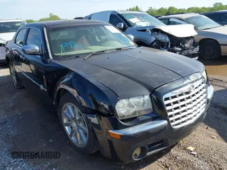 2007 Chrysler 300 C with VIN 2C3LA63H57H762801, listed as a IAAI auction lot 42092286 with 1 mi miles. Bid and sale history available at carsss.com. Image 1.