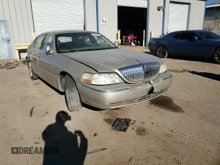 2006 Lincoln Town Car Signature z VIN 1LNHM81W76Y608239, wystawiony jako Copart lot #86654734 z przebiegiem Nie podano mil oraz Szkoda całkowita • Salvage title. Historia ofert i sprzedaży dostępna na DreamBid. Obrazek 10.