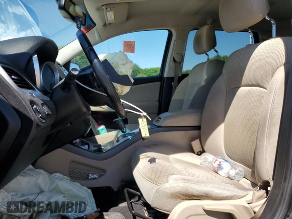 2013 Dodge Journey SE with VIN 3C4PDCAB5DT729415, listed as a Copart auction lot 55851915 with 128,782 mi miles and Salvage title. Bid and sale history available at DreamBid. Image 7.