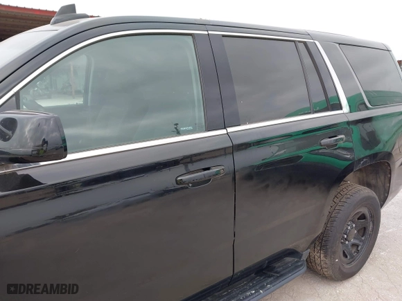 2019 Chevrolet Tahoe Commercial with VIN 1GNLCDECXKR231072, listed as a IAAI auction lot 41800007 with 100,101 mi miles. Bid and sale history available at carsss.com. Image 18.