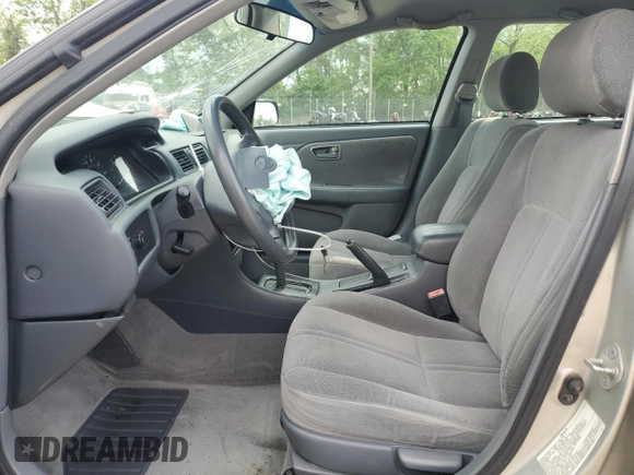 2000 Toyota Camry CE z VIN 4T1BG22K9YU653036, wystawiony jako Copart lot #55363475 z przebiegiem 84 258 mil mil oraz Szkoda całkowita • Salvage title. Historia ofert i sprzedaży dostępna na DreamBid. Obrazek 7.