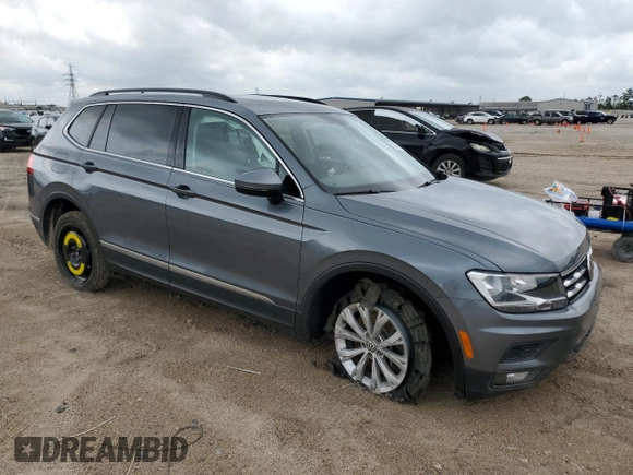 2018 Volkswagen Tiguan SEL z VIN 3VV2B7AX7JM004960, wystawiony jako Copart lot #55803665 z przebiegiem 102 492 mil mil oraz Szkoda całkowita • Salvage title. Historia ofert i sprzedaży dostępna na DreamBid. Obrazek 4.
