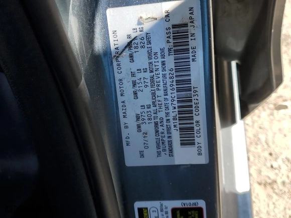 2012 Mazda Mazda3 i Grand Touring with VIN JM1BL1W79C1694826, listed as a Copart auction lot 49867895 with 206,307 mi miles and Salvage Title. Bid and sale history available at carsss.com. Image 14.