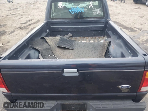 1999 Ford Ranger XL with VIN 1FTYR10C8XTA00586, listed as a Copart auction lot 42546635 with 176,902 mi miles and Salvage title. Bid and sale history available at DreamBid. Image 10.