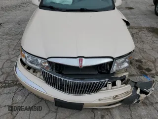 1998 Lincoln Continental with VIN 1LNFM97V5WY720999, listed as a Copart auction lot 84705054 with 0 mi miles and Salvage Title. Bid and sale history available at carsss.com. Image 12.