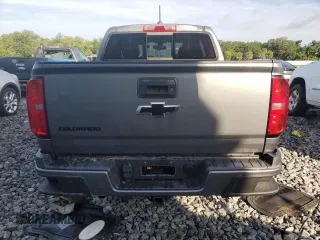 2019 Chevrolet Colorado 2WD LT с VIN 1GCGSCEN7K1347692, выставлен на аукционе Copart как лот 58117865 с пробегом 36 744 миль миль и Списание • Salvage title. История ставок и продаж доступна на DreamBid. Изображение 6.