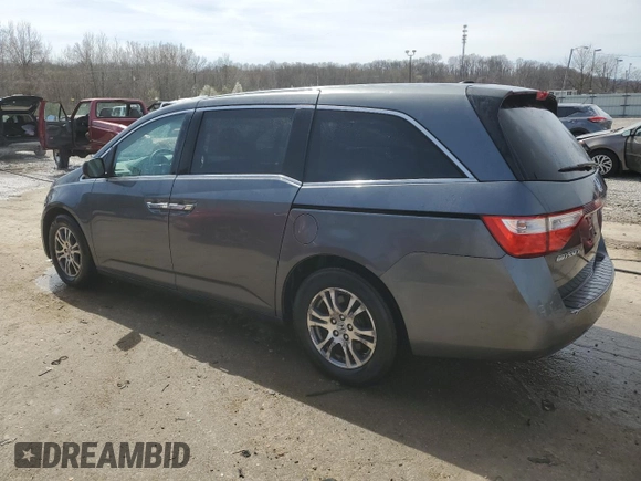 2012 Honda Odyssey EX-L with VIN 5FNRL5H61CB067331, listed as a Copart auction lot 50016455 with 156,020 mi miles and Non Repairable. Bid and sale history available at DreamBid. Image 2.