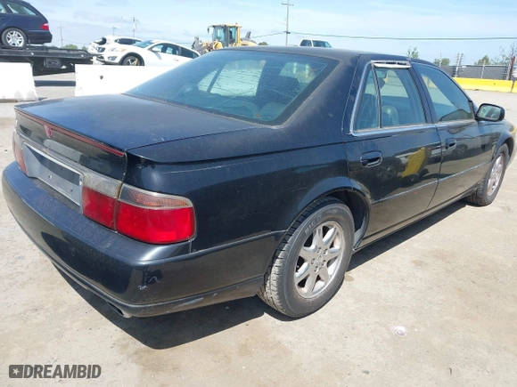1998 Cadillac Seville Touring STS with VIN 1G6KY5499WU916185, listed as a IAAI auction lot 42035783 with 164,763 mi miles. Bid and sale history available at carsss.com. Image 4.