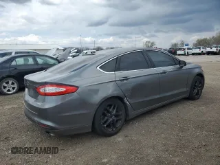 2014 Ford Fusion SE with VIN 3FA6P0HD0ER357348, listed as a Copart auction lot 52774725 with 147,385 mi miles and Salvage Title. Bid and sale history available at DreamBid. Image 3.