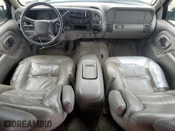 1999 Chevrolet Suburban with VIN 1GNFK16R9XJ516000, listed as a Copart auction lot 73854994 with 263,079 mi miles and Salvage Title. Bid and sale history available at carsss.com. Image 8.