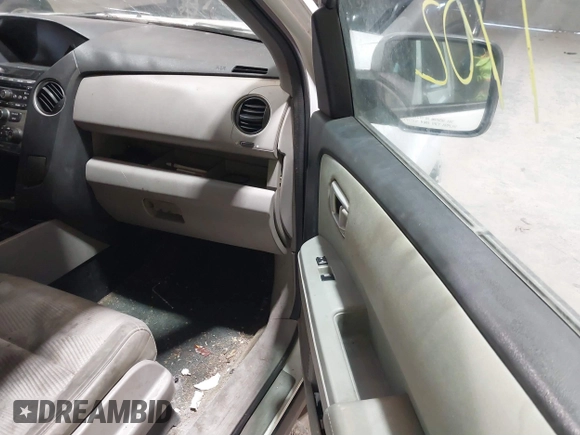 2014 Honda Pilot LX with VIN 5FNYF4H27EB025811, listed as a IAAI auction lot 41501702 with 144,909 mi miles and . Bid and sale history available at DreamBid. Image 5.