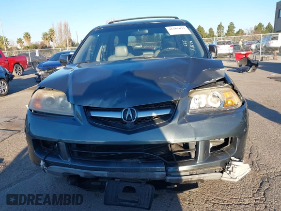 2006 Acura MDX with VIN 2HNYD18246H549248, listed as a IAAI auction lot 41361032 with 176,399 mi miles. Bid and sale history available at carsss.com. Image 12.