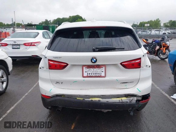 2019 BMW X1 xDrive28i with VIN WBXHT3C54K3H35641, listed as a IAAI auction lot 42241894 with 100,989 mi miles and . Bid and sale history available at DreamBid. Image 16.